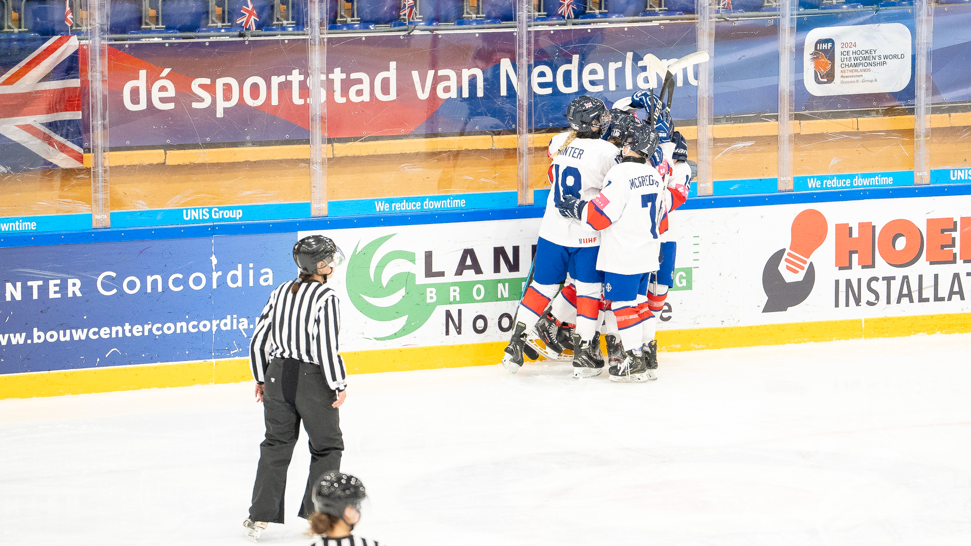 Great Britain celebrate their third goal against Netherlands at the Under-18 Women's World Championship Division II Group A