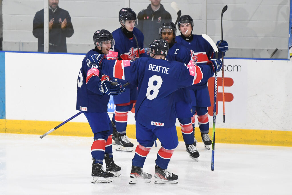 Great Britain Under-20s celebrate scoring against Lithuania