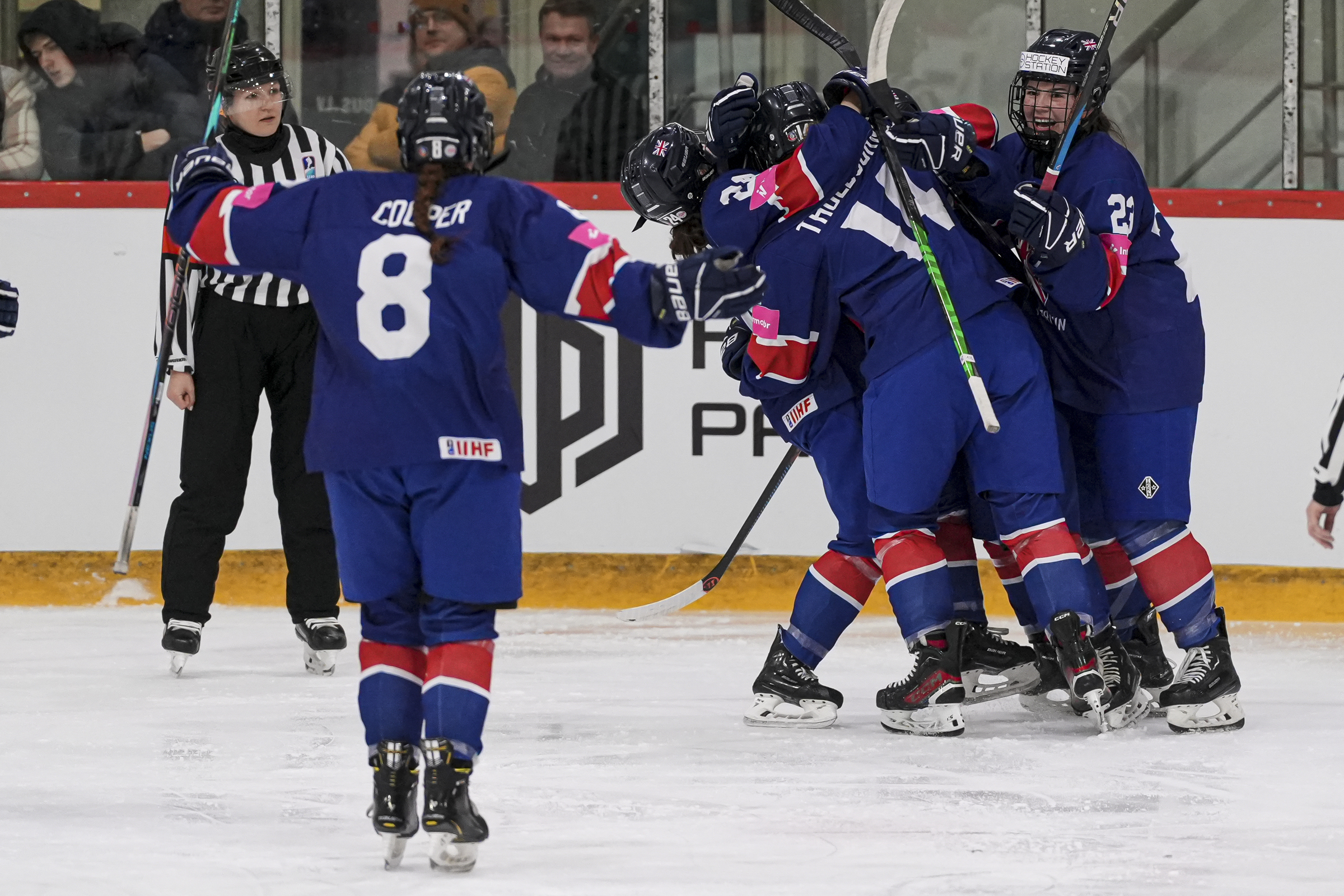 Great Britain celebrate scoring against Kazakhstan in the Under-18 Women's World Championship Division II Group A in Riga