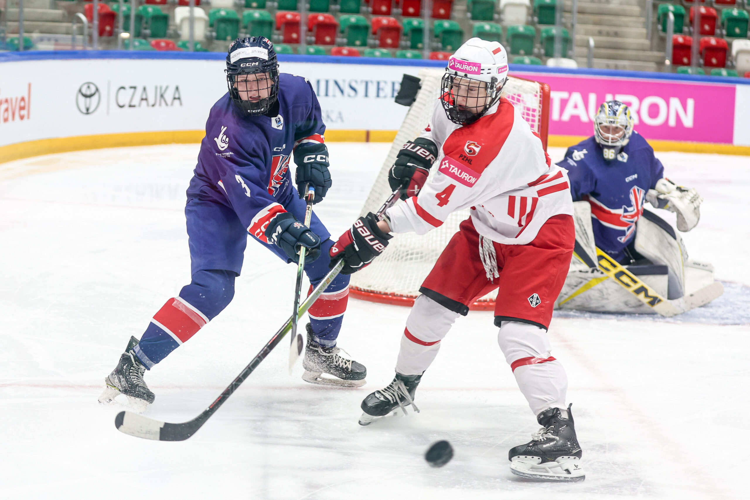 Madison Wright in action for Great Britain against Poland in the IIHF Women's European Cup of Nations